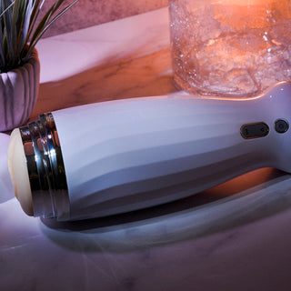 Zero Tolerance THE THRUSTING RECHARGEABLE STROKER  WHITE/CHROME - For Him - The Naughty & Nice District - Adult Sex Toy Store